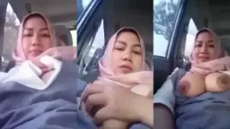 Tante Berjilbab Pamer Payudara Montok Sambil Menggoda Di Dalam Mobil